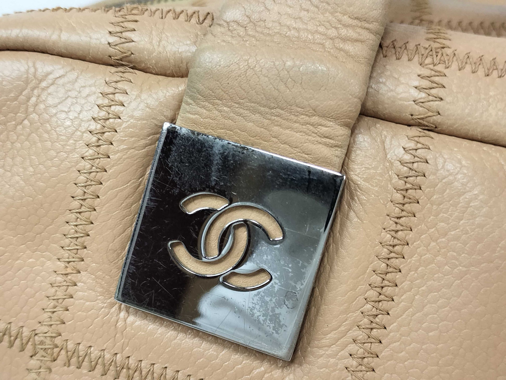 CHANEL Caviar Skin Handbag with Coco Mark and Silver Hardware, Beige