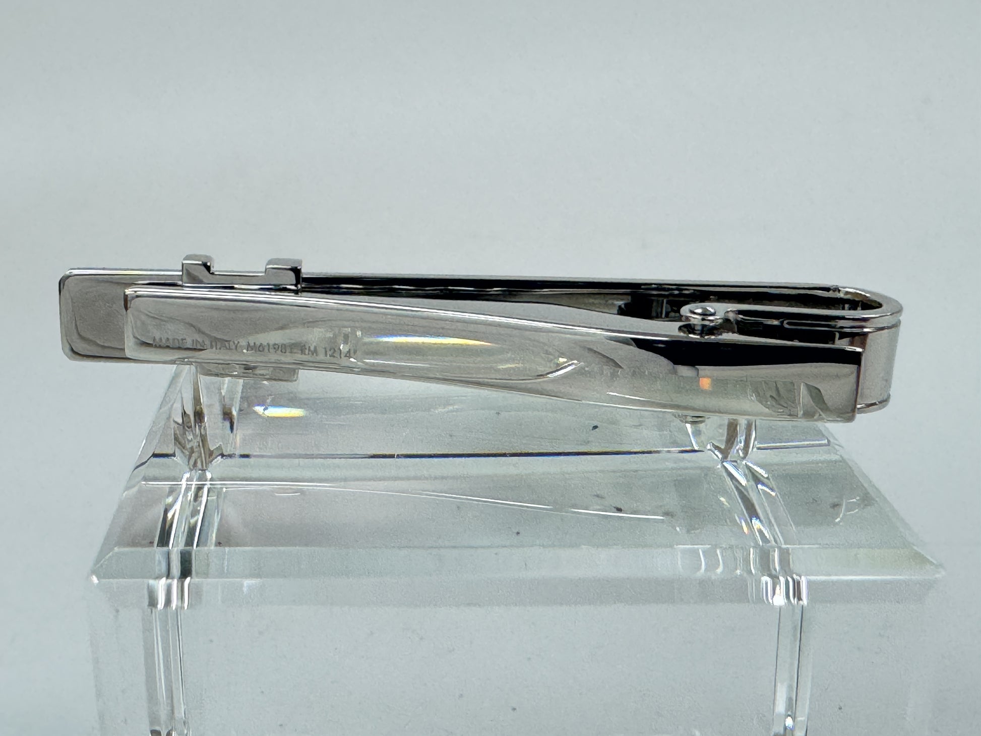 LOUIS VUITTON Monogram cufflinks and tie clip.