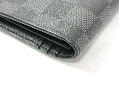 LOUIS VUITTON Damier Graphite LOUIS VUITTON Damier Graphite Portefeuille Brazza? Wallet
