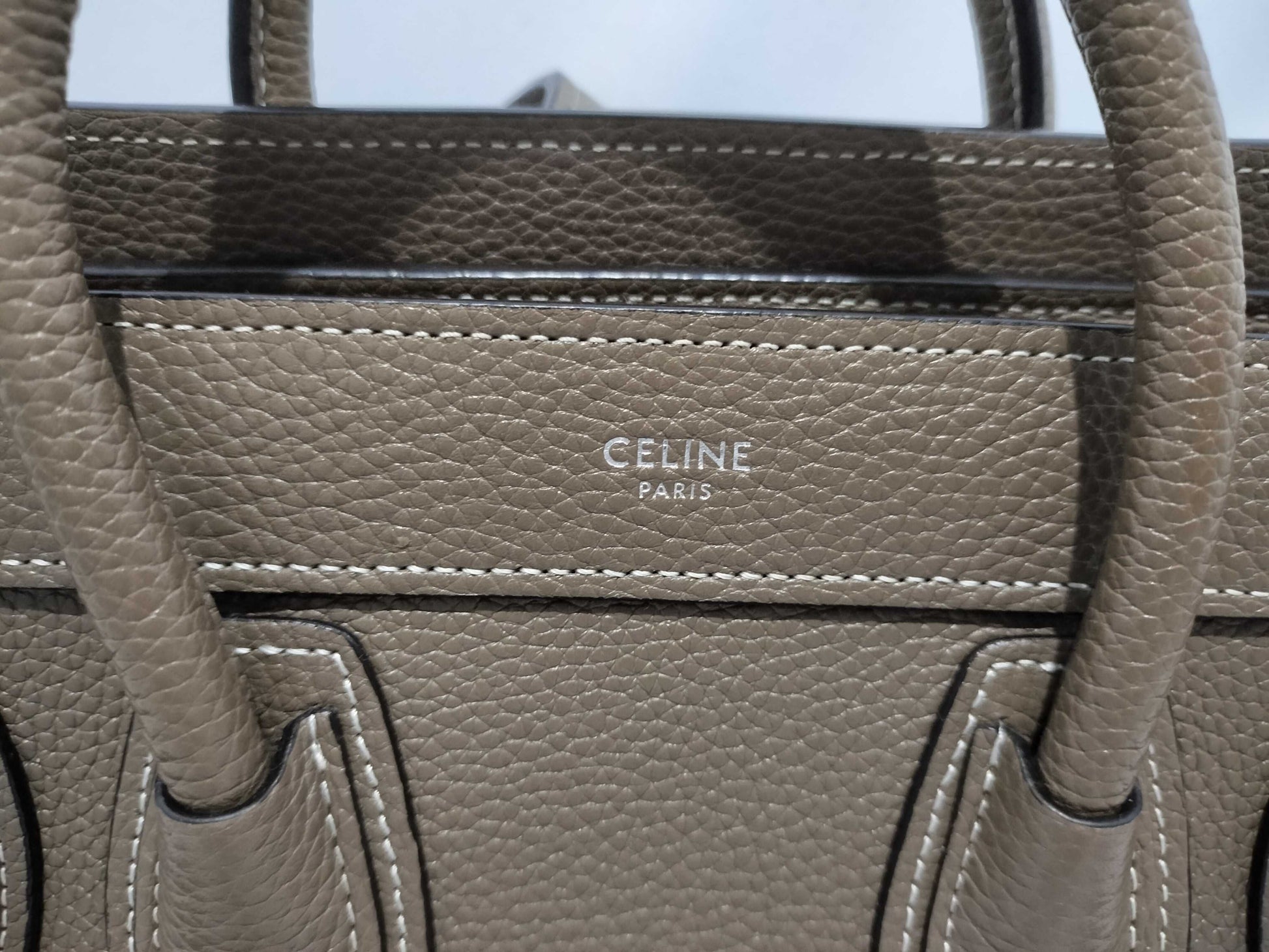 CELINE Drummed Calfskin Fragrance Nano Shopper Leather 2-Way Handbag in Greige with Silver Hardware and Dust Bag. Includes Shoulder Strap.