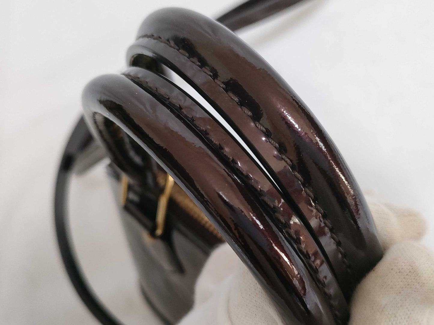 LOUIS VUITTON Vernis Amarante Alma Handbag