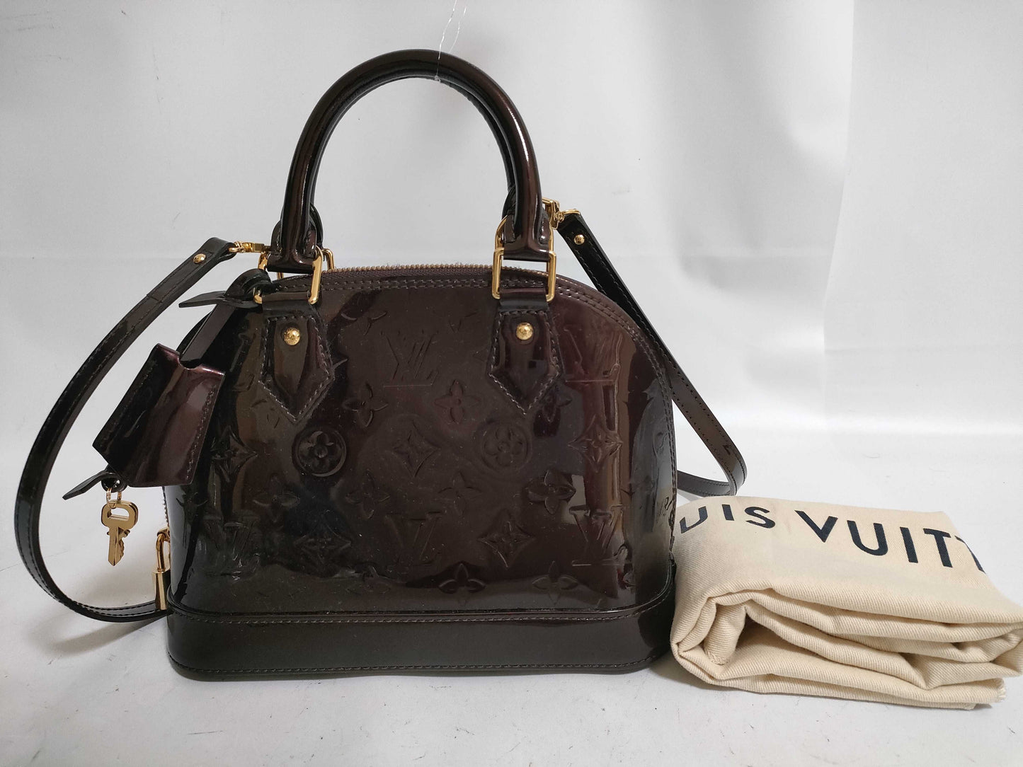 LOUIS VUITTON Vernis Amarante Alma Handbag
