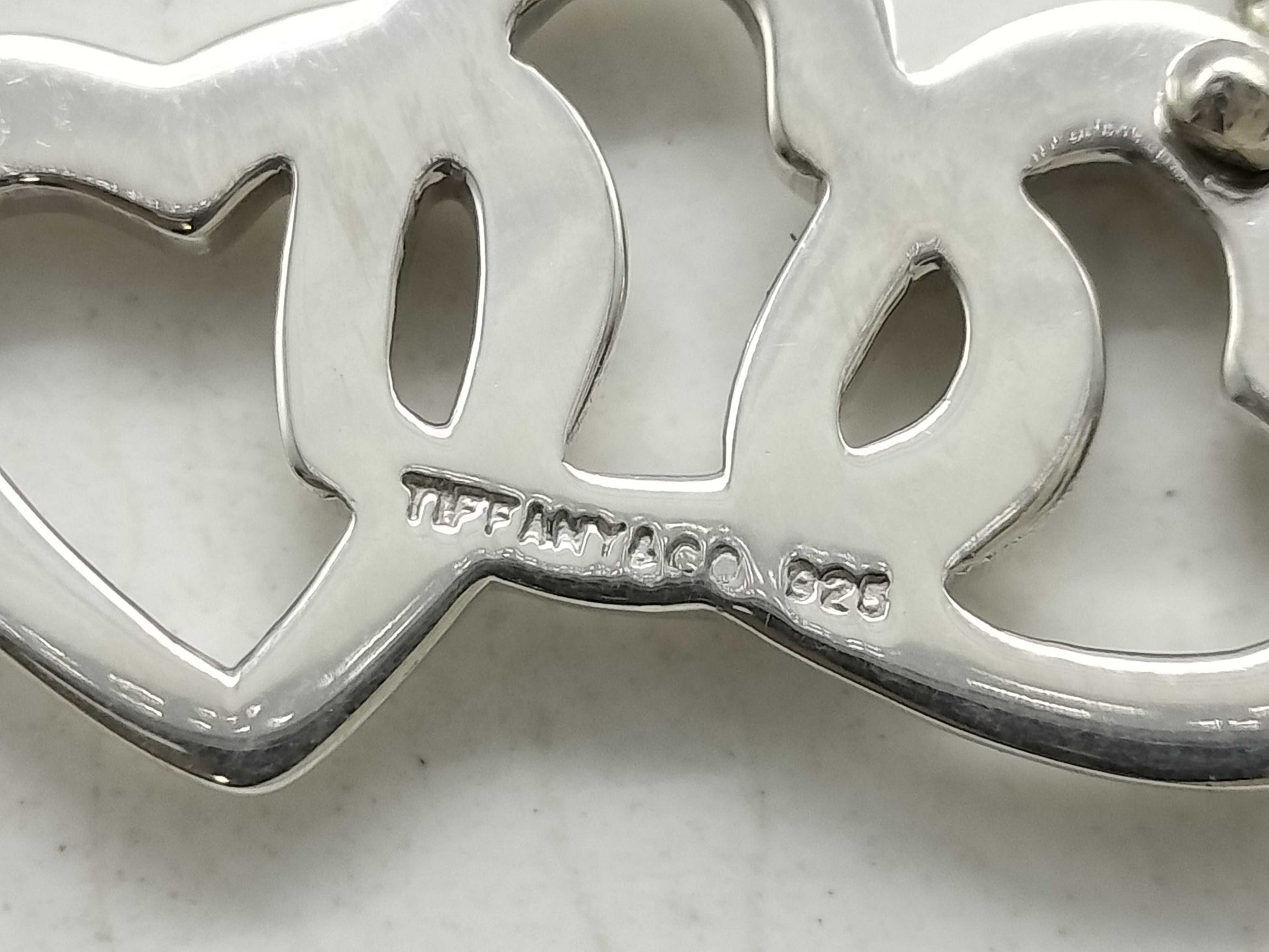 Tiffany & Co. Tiffany Triple Heart Necklace