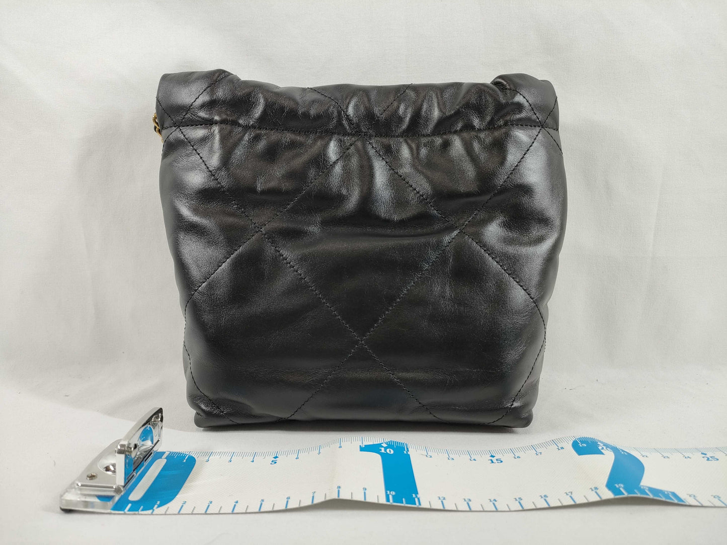 CHANEL CHANEL 22 Shiny Calfskin Chain Shoulder Bag with Gold Hardware and Serial Number Plate in Black