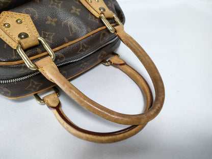 LOUIS VUITTON Monogram Manhattan Handbag