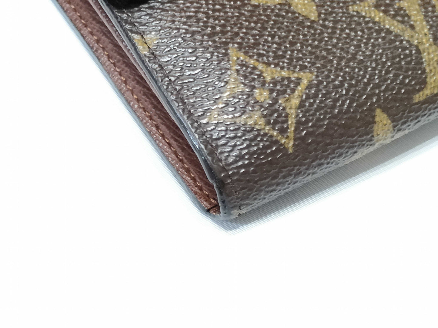 LOUIS VUITTON Two Louis Vuitton long wallets: Portefeuille Sarah and Damier Monogram.