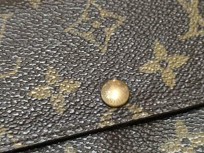 LOUIS VUITTON Two Louis Vuitton long wallets: Portefeuille Sarah and Damier Monogram.