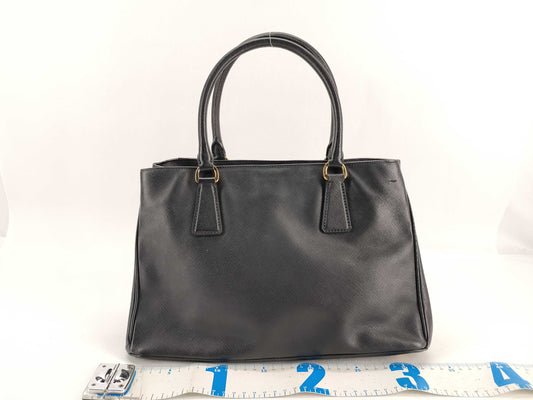 PRADA PRADA Saffiano Handbag in Black Leather with Shoulder Strap/Crochet/Gallery