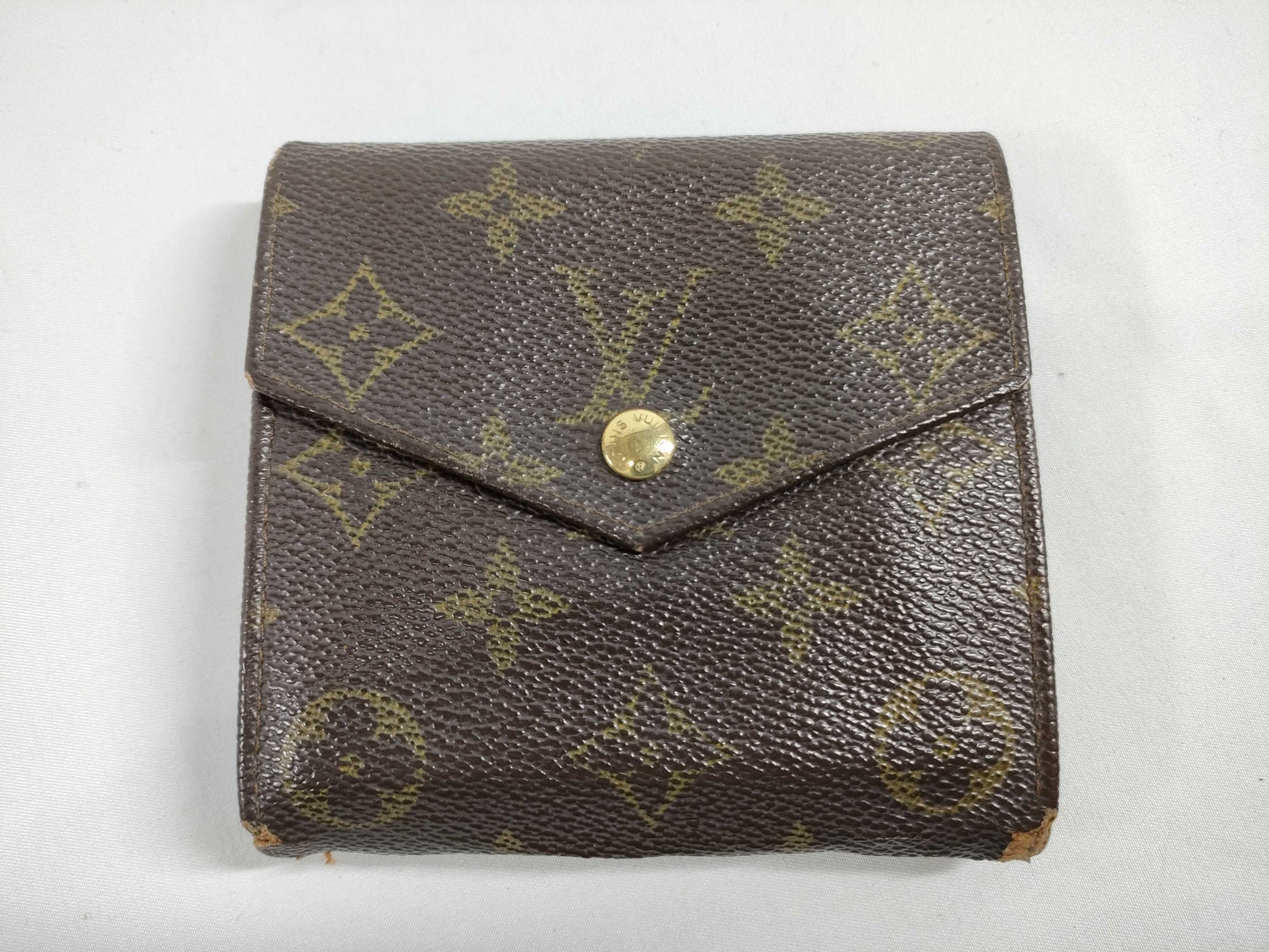LOUIS VUITTON Louis Vuitton Porte Monnaie Bi-Eye Carte Credit Monogram Wallet with Gold Hardware M61660