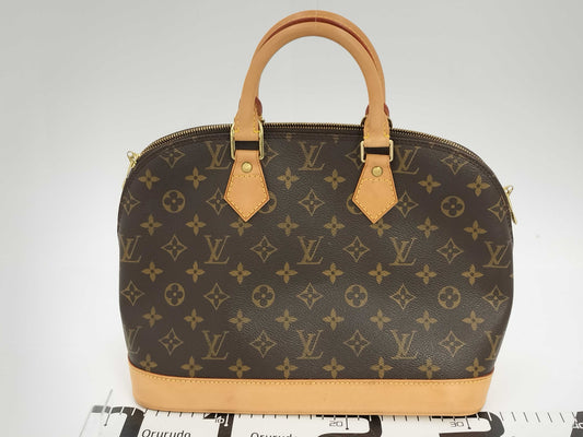 LOUIS VUITTON Monogram ALMA Handbag