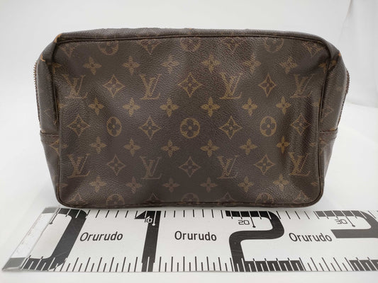 LOUIS VUITTON Louis Vuitton Monogram True Toilette Clutch Bag