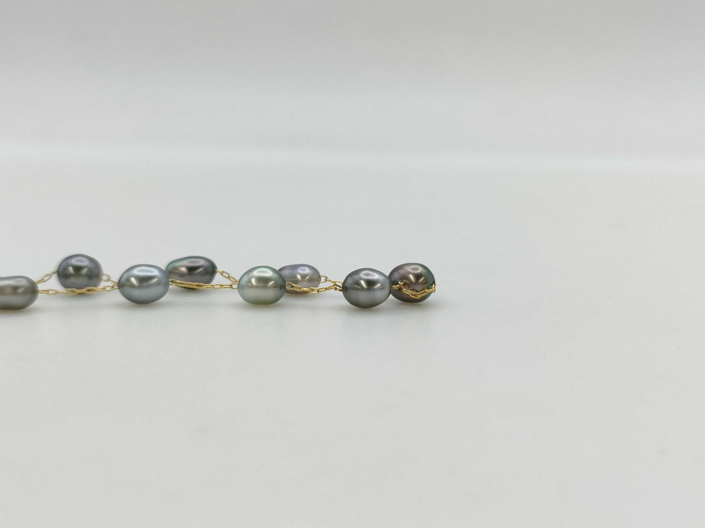 Semi-round pearl necklace, diameter approximately 4.0-4.7mm, 14K gold, 5.2g 