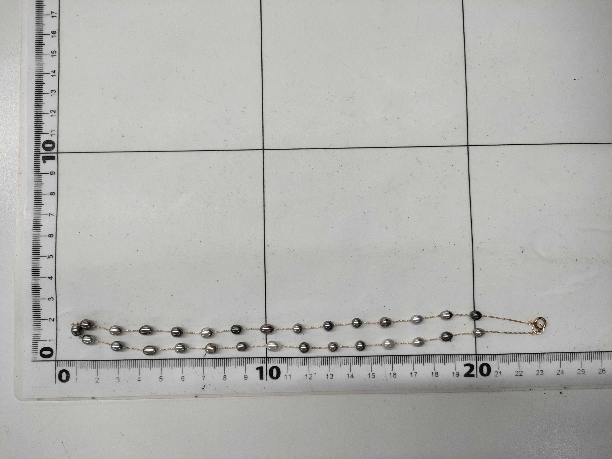 Semi-round pearl necklace, diameter approximately 4.0-4.7mm, 14K gold, 5.2g 