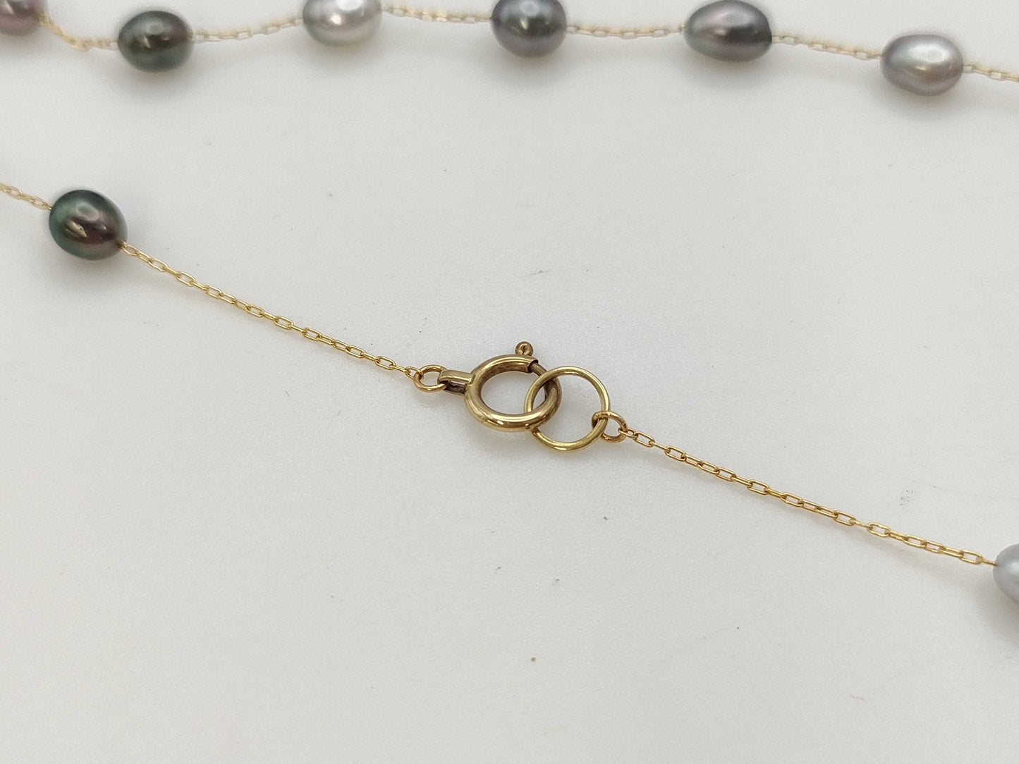Semi-round pearl necklace, diameter approximately 4.0-4.7mm, 14K gold, 5.2g 