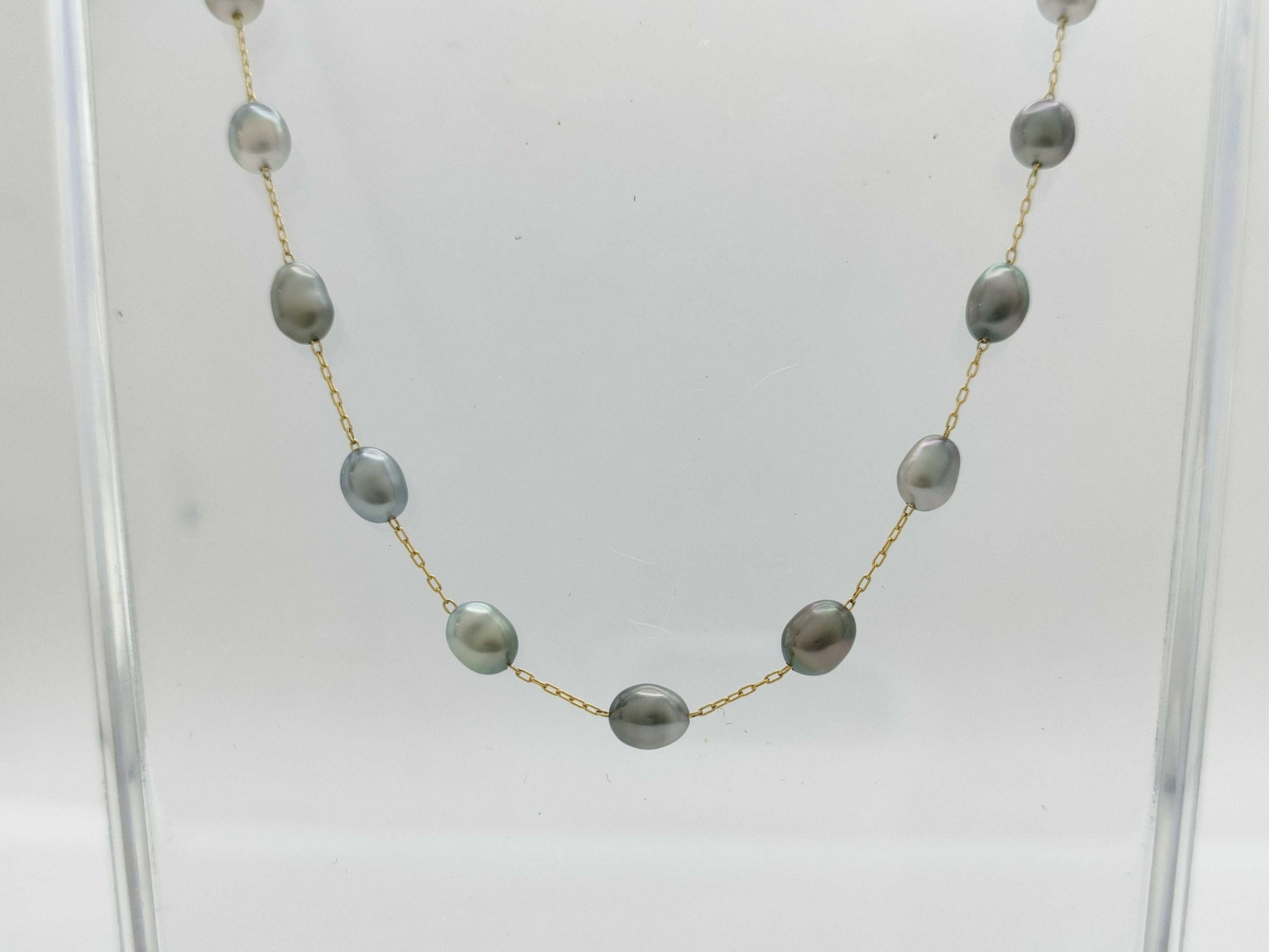 Semi-round pearl necklace, diameter approximately 4.0-4.7mm, 14K gold, 5.2g 