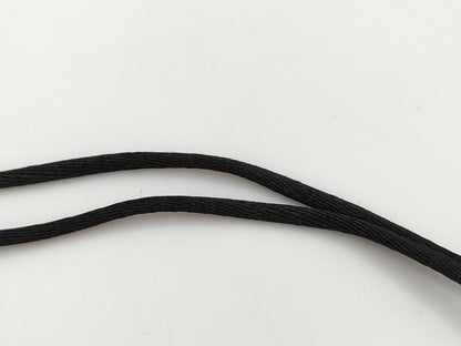 Dior logo mirror ball necklace with rhinestones and lip gloss.