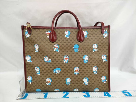 GUCCI GG Supreme Gucci 653952 Doraemon Mini GG Supreme Tote Bag