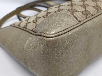 GUCCI Gold Trim Monogram Bucket Bag with Long Strap Handbag