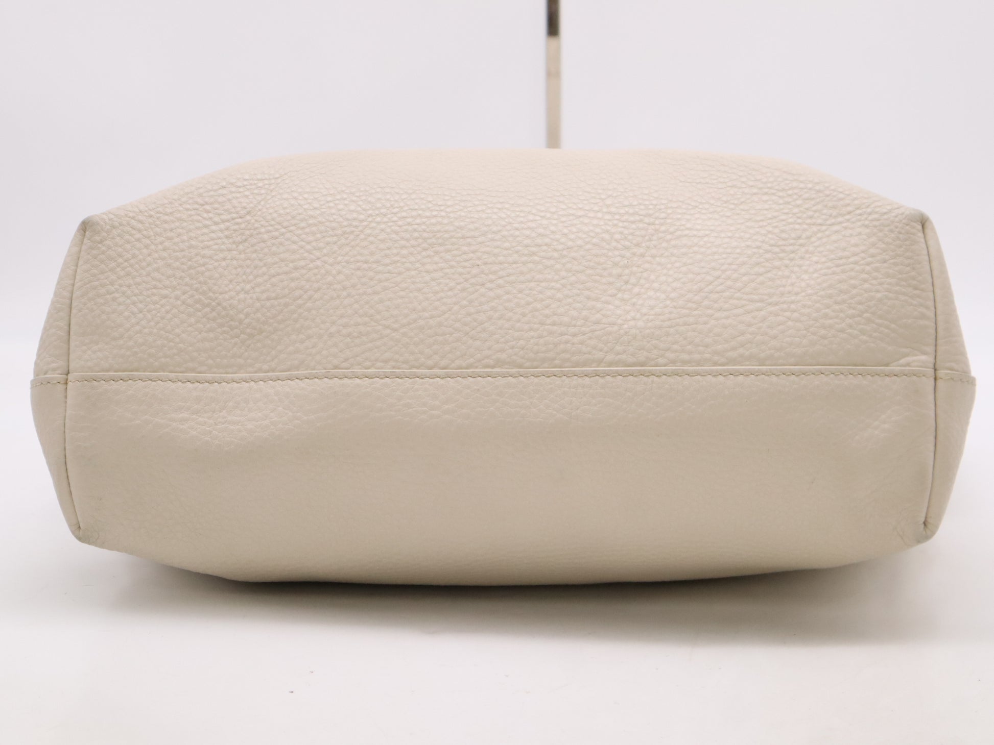 PRADA 2-way leather tote bag in white with GD hardware, shoulder strap, and name tag.