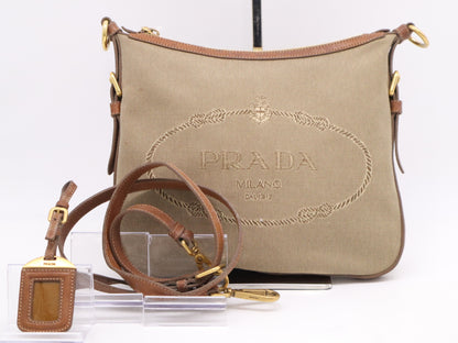 PRADA Leather Jacquard Logo Shoulder Bag in Beige and Brown with GD Hardware, Shoulder Strap, and Name Tag