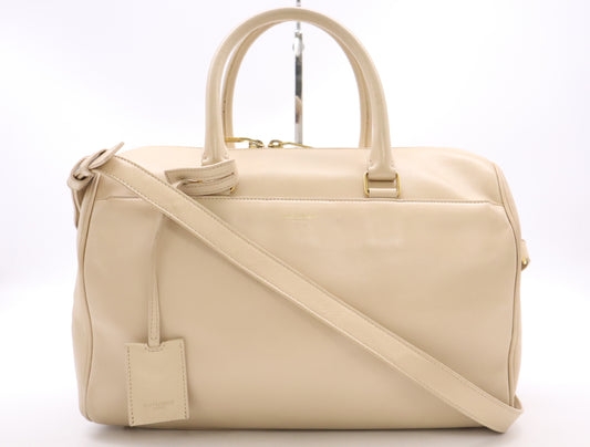 SAINT LAURENT Leather Classic Duffle 6 2-way Handbag/Shoulder Bag in Beige with GD Hardware and Clochet closure
