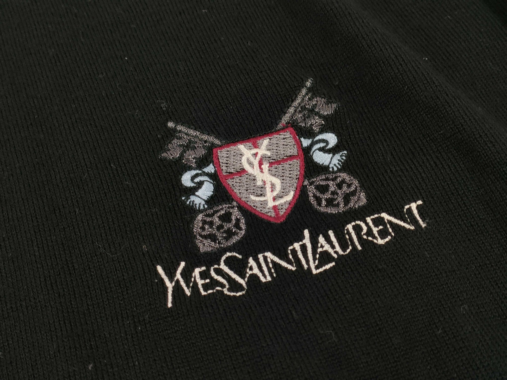 Yves Saint Laurent sweater with YSL patch, black top