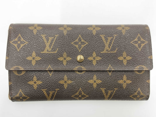 LOUIS VUITTON M Monogram Porte Tresor International Tri-fold Long Wallet