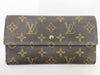 LOUIS VUITTON M Monogram Porte Tresor International Tri-fold Long Wallet
