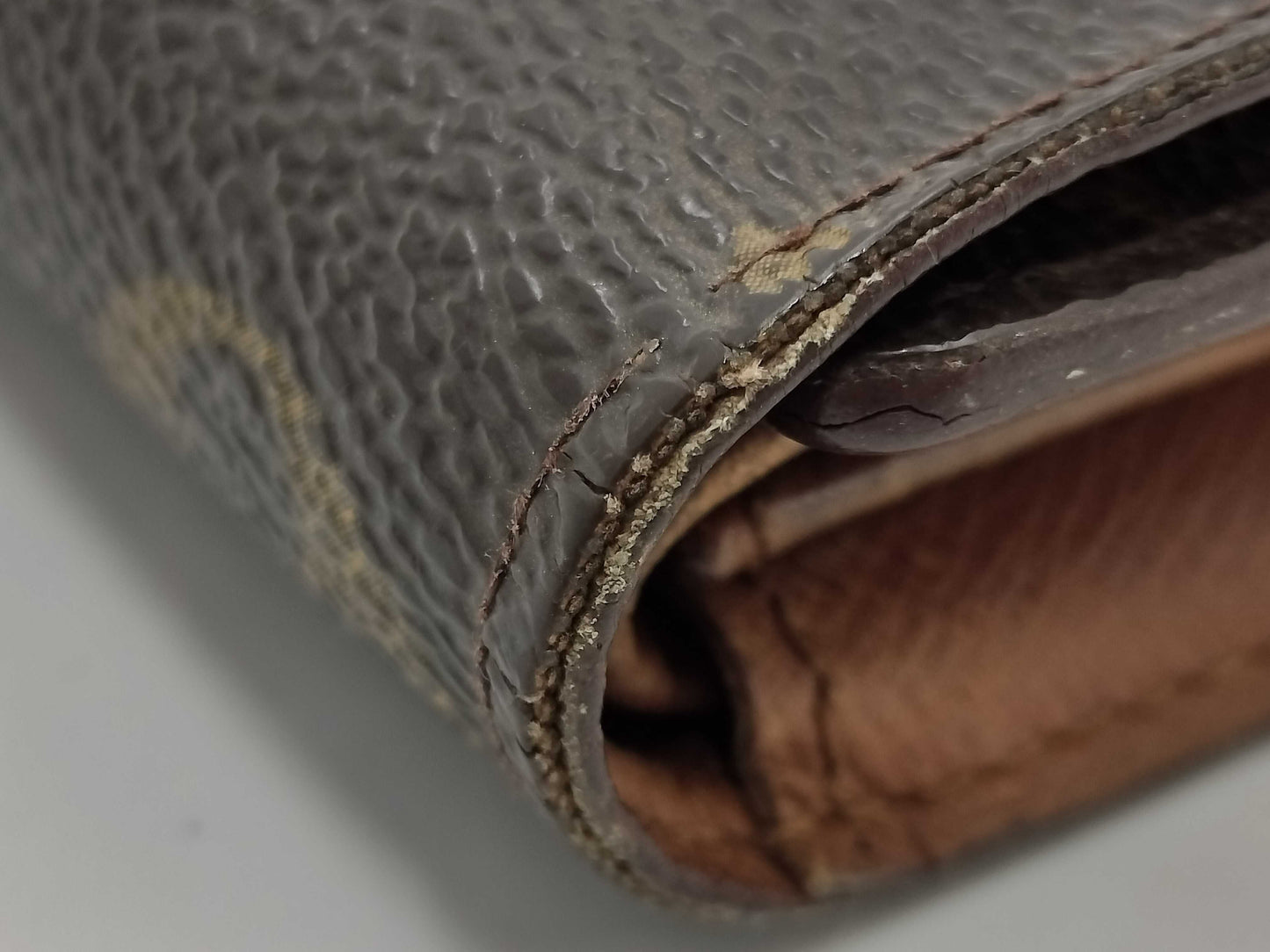 LOUIS VUITTON M Monogram Porte Tresor International Tri-fold Long Wallet