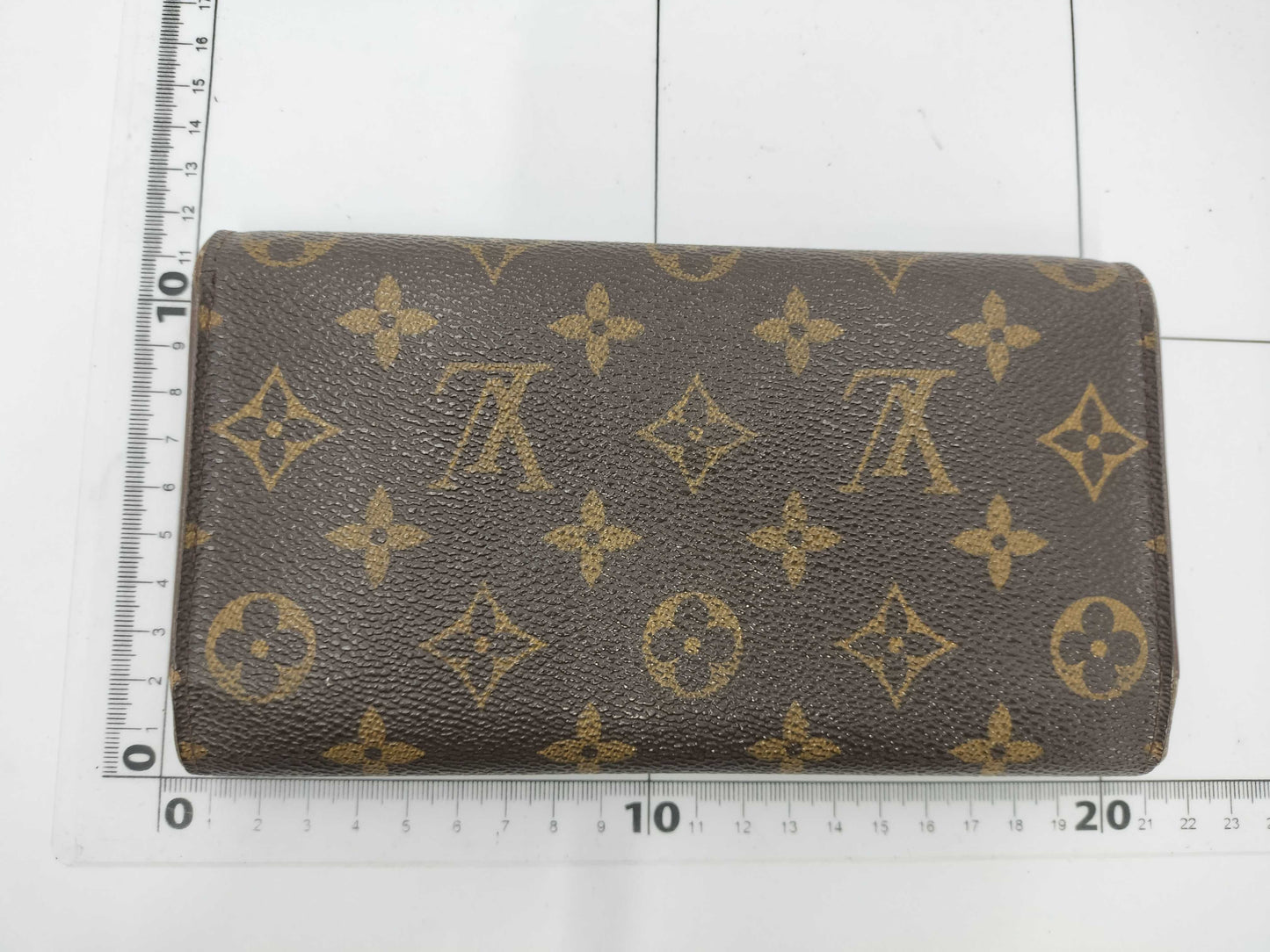LOUIS VUITTON M Monogram Porte Tresor International Tri-fold Long Wallet