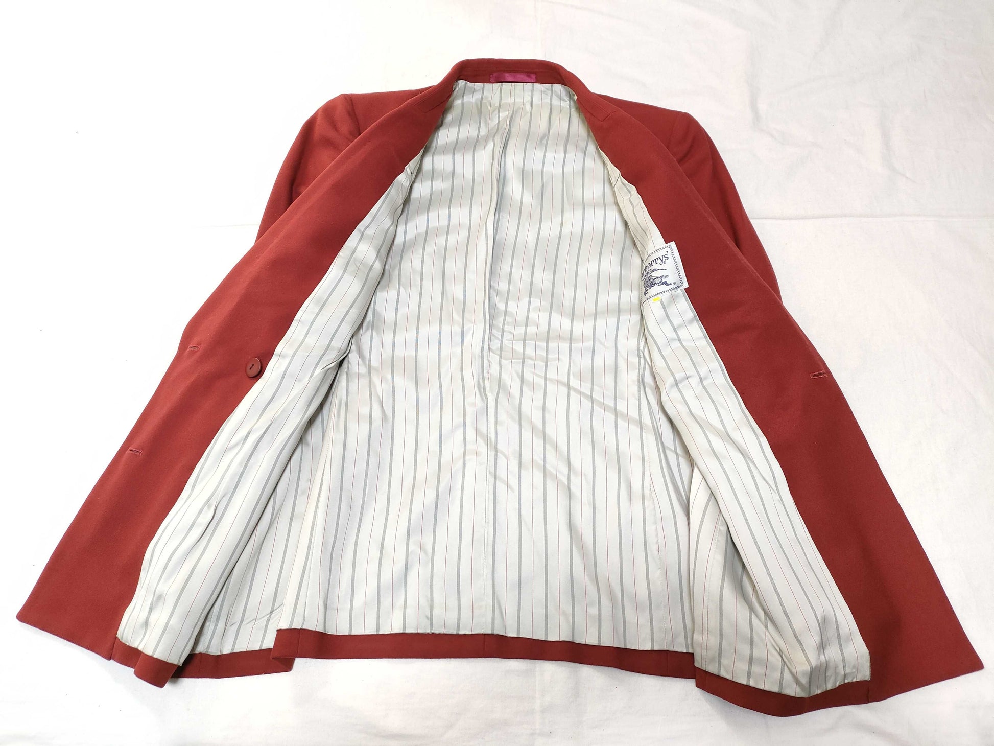 Burberry Navy Blazer with Horse Embroidery and Gold Buttons.