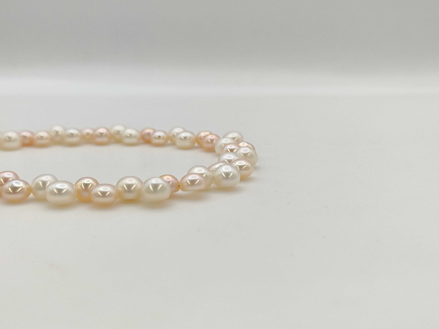 Semi-round pearl, diameter approximately 5.5-5.9mm, 18K gold, 19.8g, necklace 