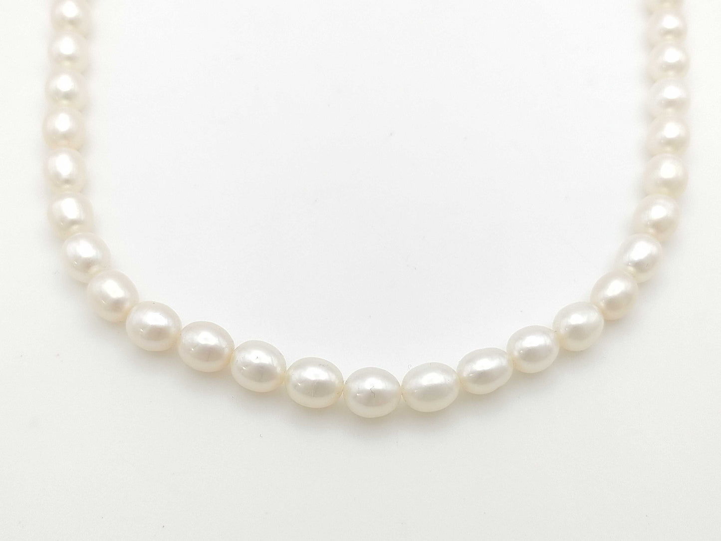 Semi-round pearl, diameter approximately 7.0-7.4mm, 18K white gold, 33.3g, necklace 