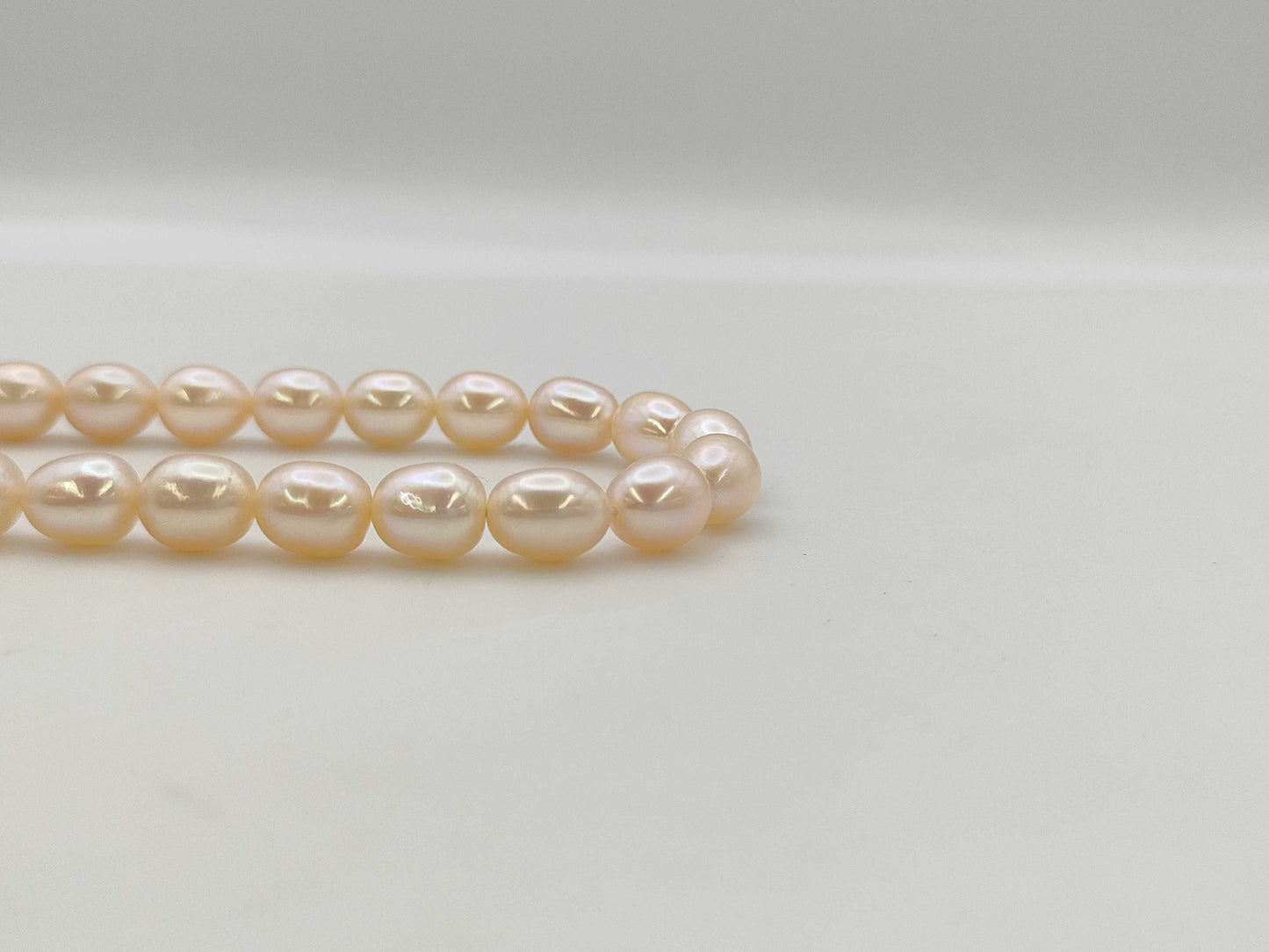 Semi-round pearl, diameter approximately 6.9-7.4mm, 18K white gold, 32.7g, necklace 