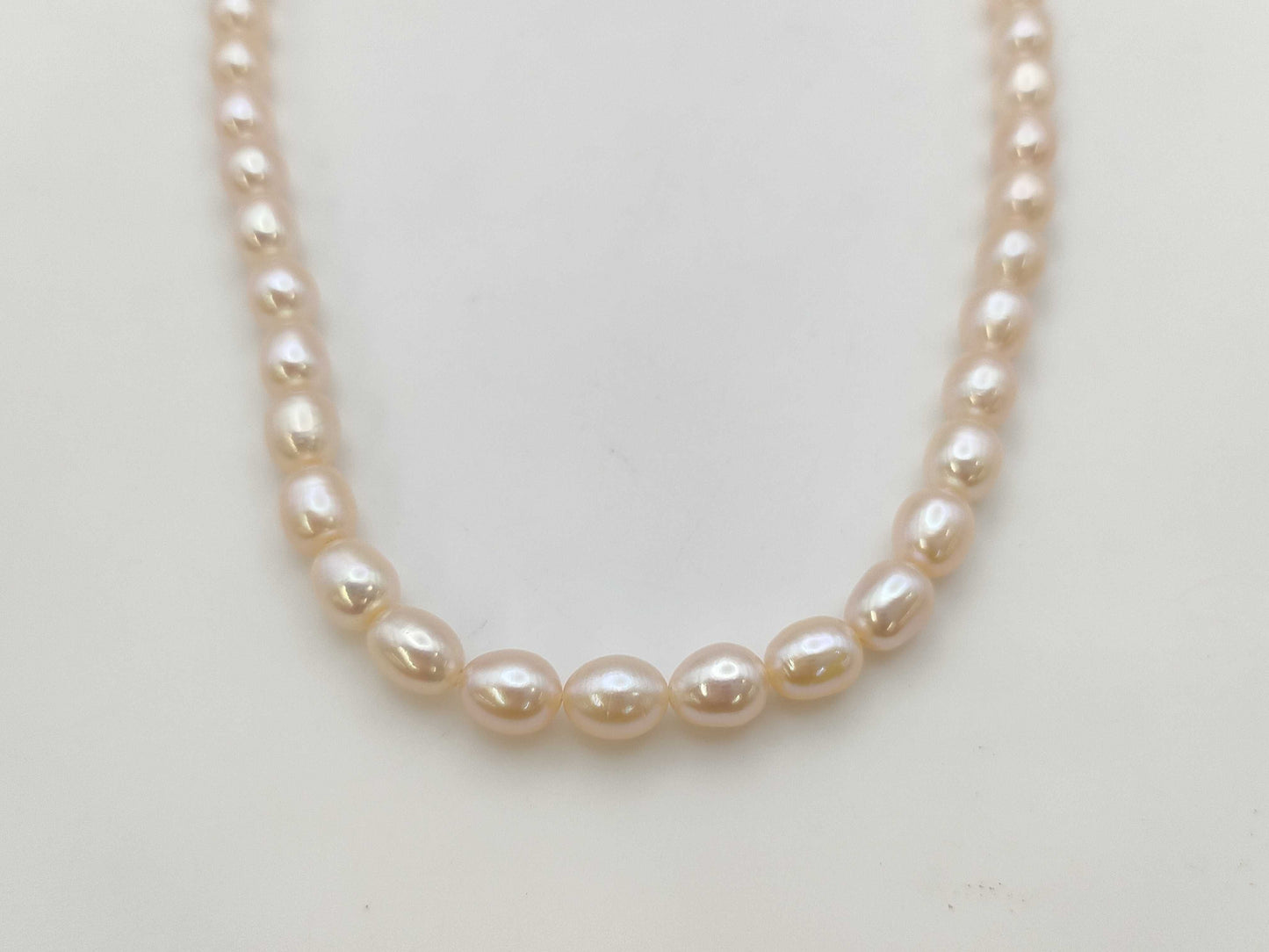 Semi-round pearl, diameter approximately 6.9-7.4mm, 18K white gold, 32.7g, necklace 