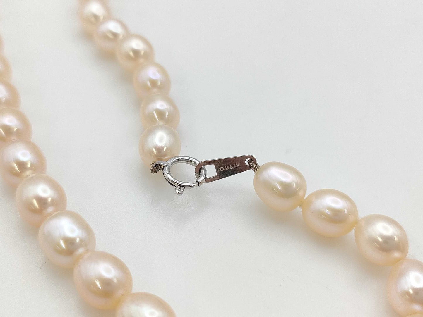 Semi-round pearl, diameter approximately 6.9-7.4mm, 18K white gold, 32.7g, necklace 