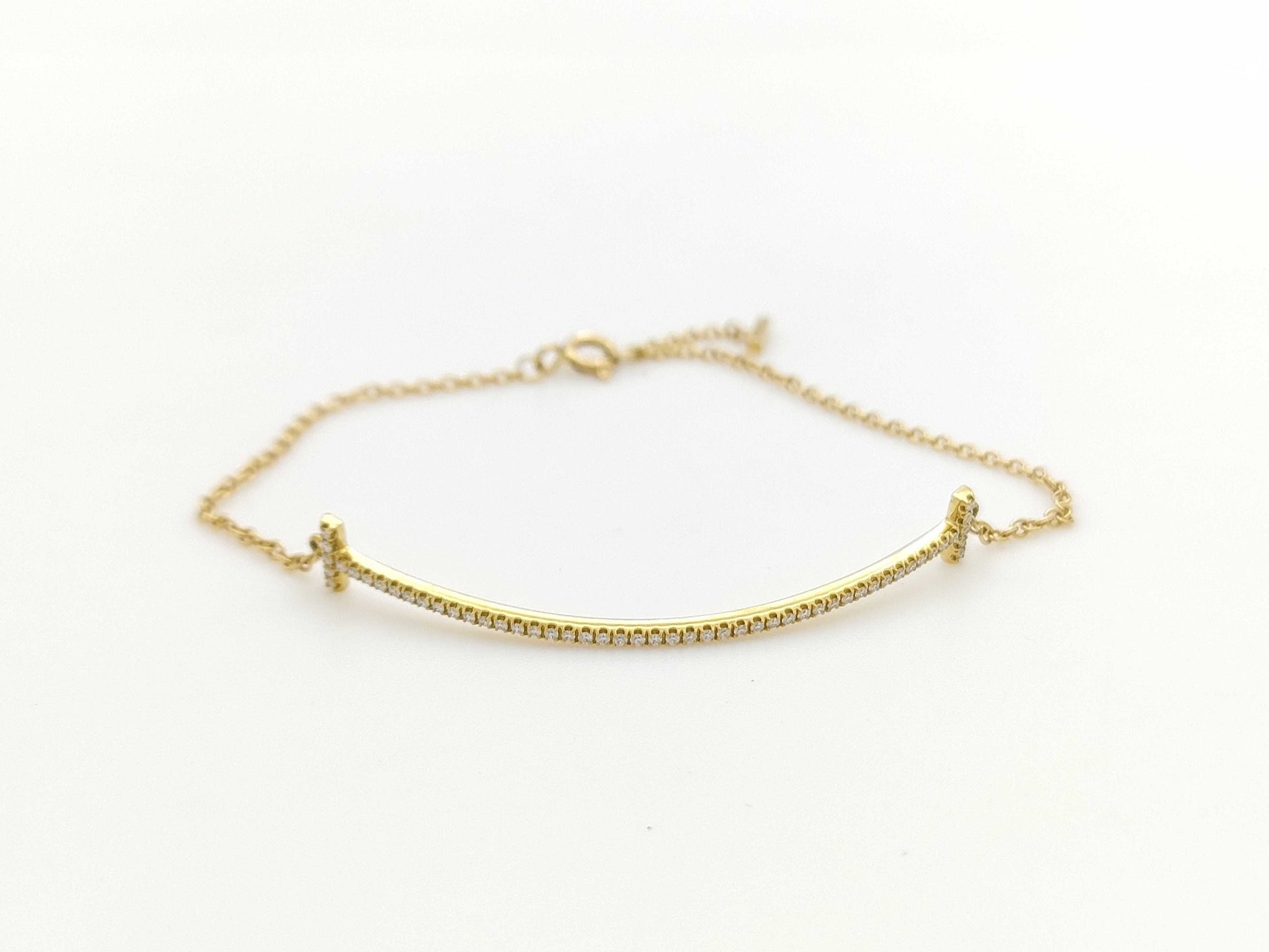 Tiffany & Co. T Smile Diamond Bracelet/Bangle in Yellow Gold and AU750, 2.6g 