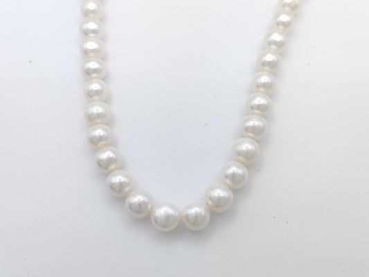 Semi-round pearl necklace, diameter approximately 9.4-10.5mm, sterling silver, 64.0g .