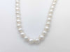 Semi-round pearl necklace, diameter approximately 9.4-10.5mm, sterling silver, 64.0g .