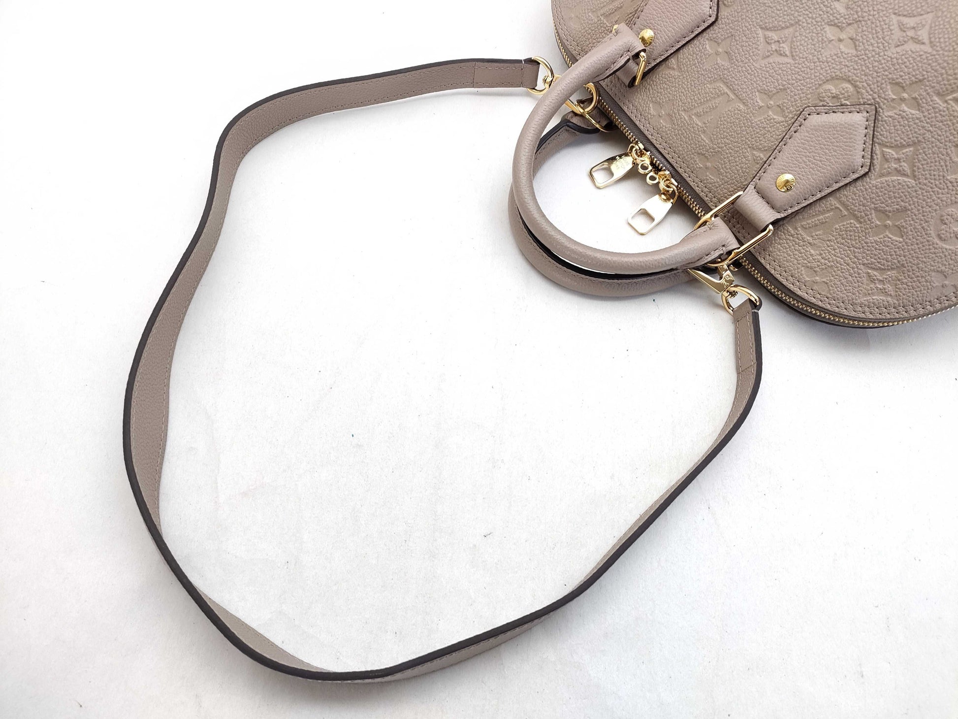 LOUIS VUITTON Monogram Empreinte Louis Vuitton Neo Alma Empreinte Handbag