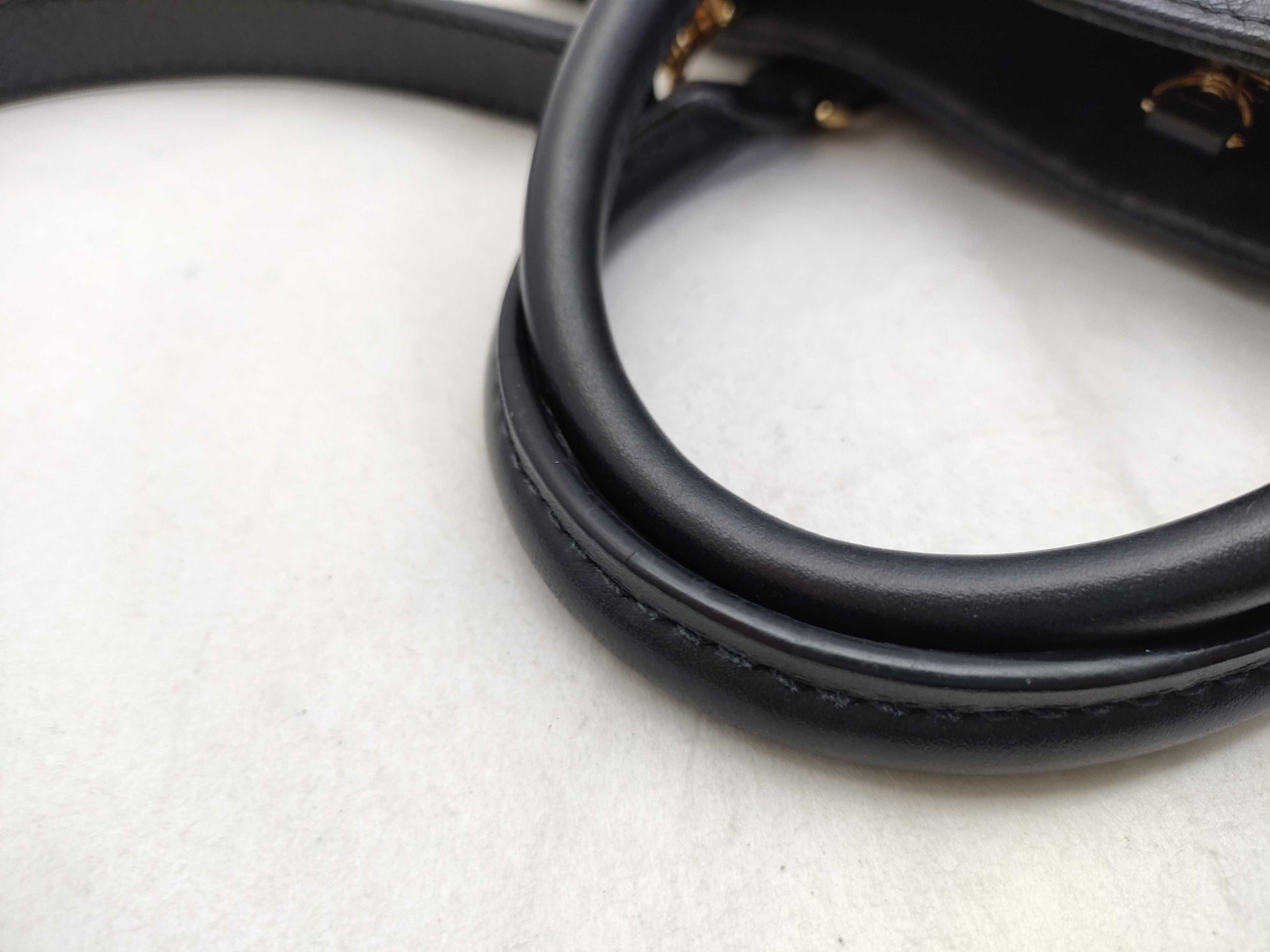 LOUIS VUITTON Monogram Empreinte Louis Vuitton On the Go PM Empreinte Handbag