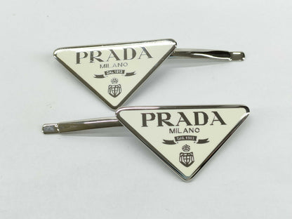 PRADA Prada Logo Hairpin. Accessories: Box, Dust Bag. Hair Accessory.