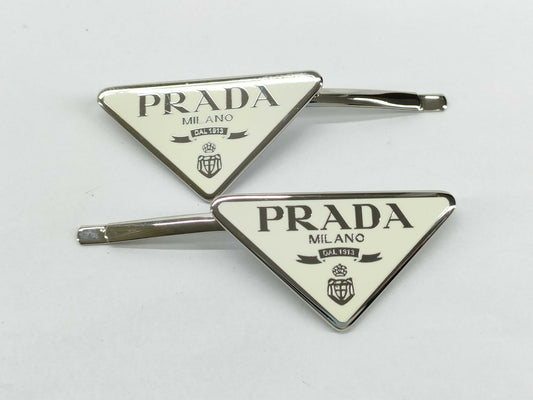 PRADA Prada Logo Hairpin. Accessories: Box, Dust Bag. Hair Accessory.