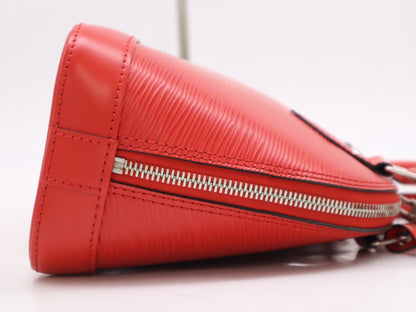 LOUIS VUITTON M41160 Epi Alma BB Coquelicot Handbag with Shoulder Strap, Cloche, Cadena, and Two Keys