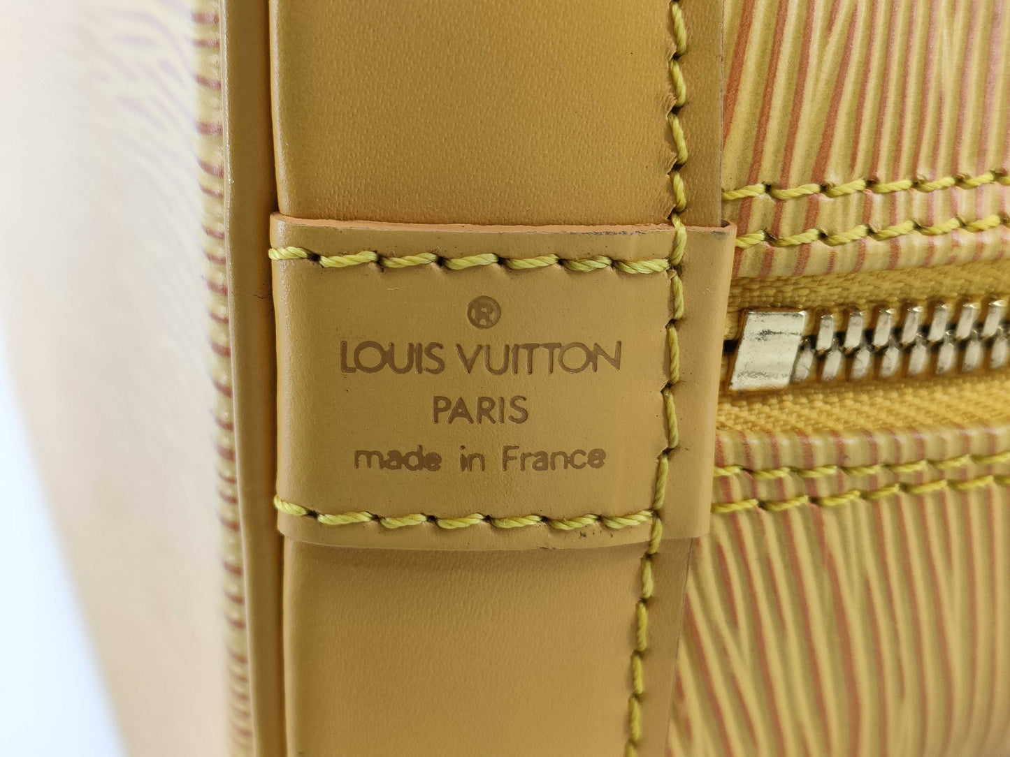 LOUIS VUITTON Epi Alma Yellow Handbag