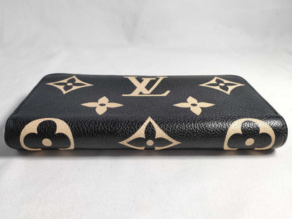 LOUIS VUITTON Monogram Empreinte Zippy Wallet in Black and Beige with IC Tag and G Hardware