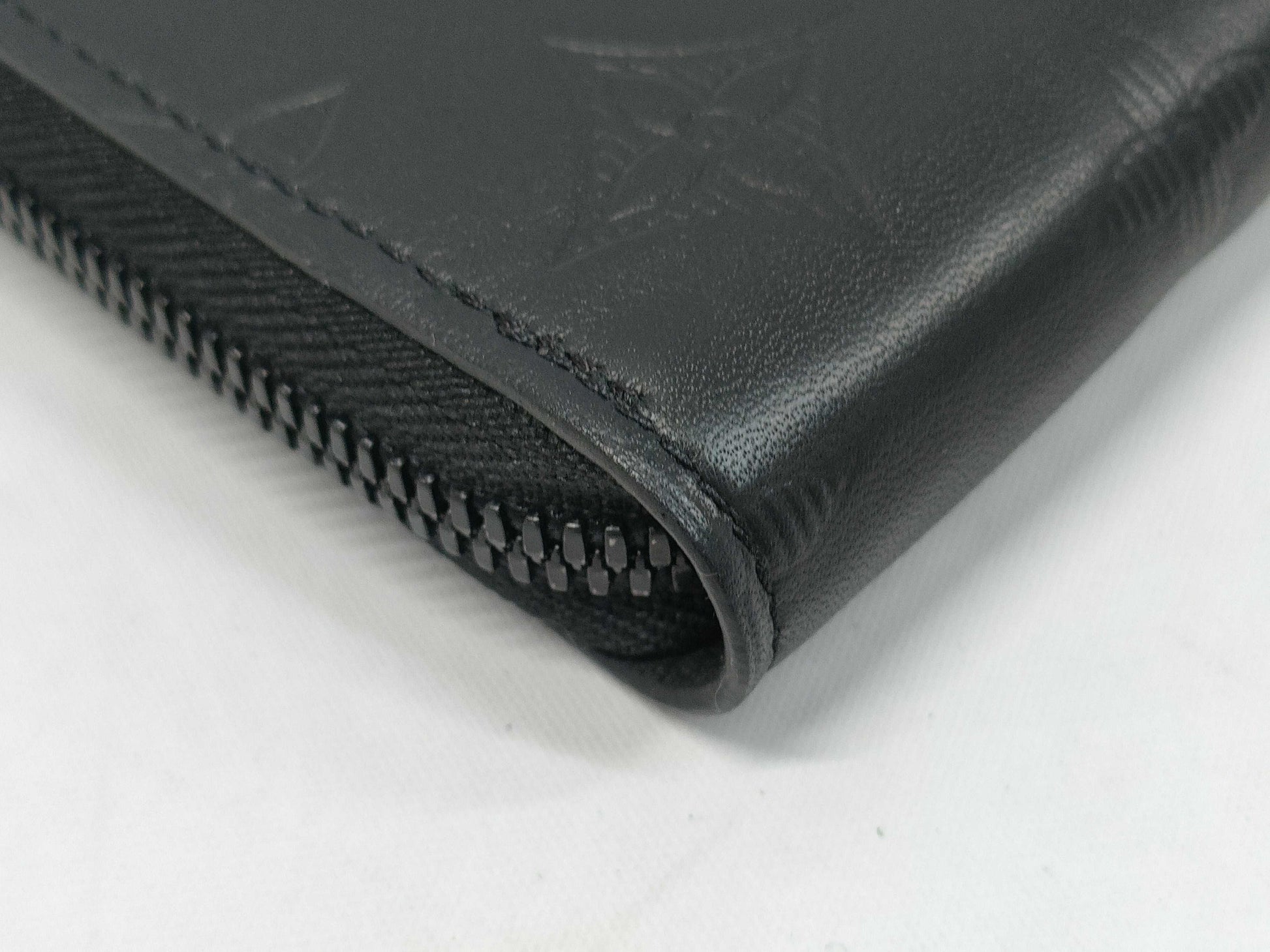 LOUIS VUITTON Zippy Wallet Vertical Monogram Shadow. Includes box, dust bag, and other original accessories. Brand new, unused wallet.