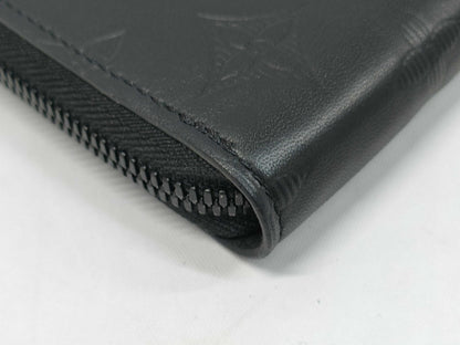 LOUIS VUITTON Zippy Wallet Vertical Monogram Shadow. Includes box, dust bag, and other original accessories. Brand new, unused wallet.