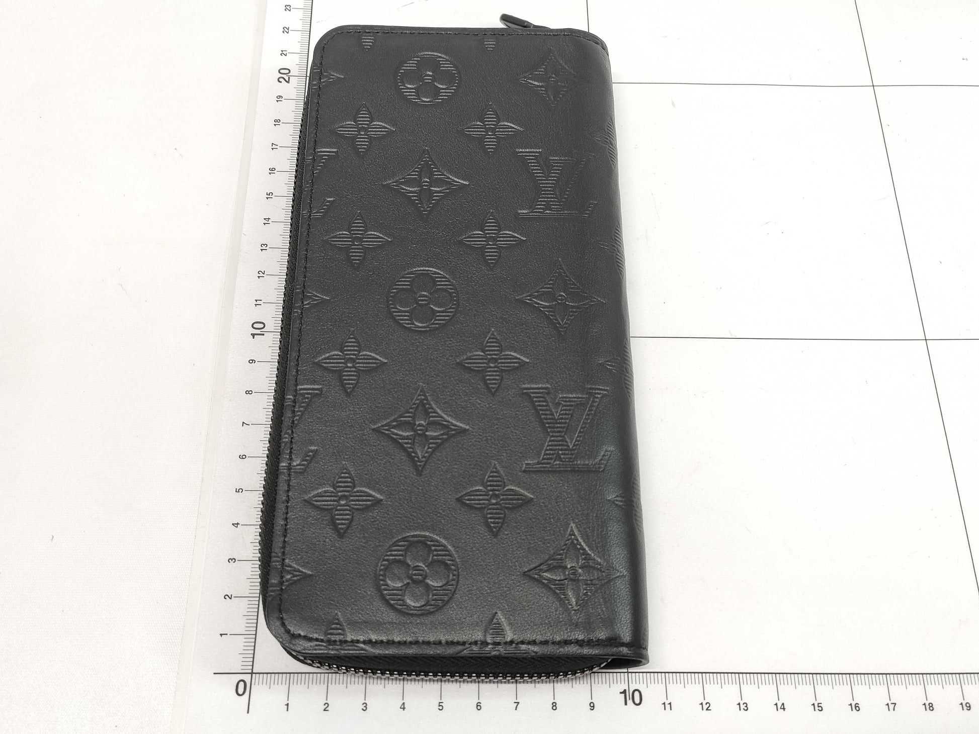 LOUIS VUITTON Zippy Wallet Vertical Monogram Shadow. Includes box, dust bag, and other original accessories. Brand new, unused wallet.