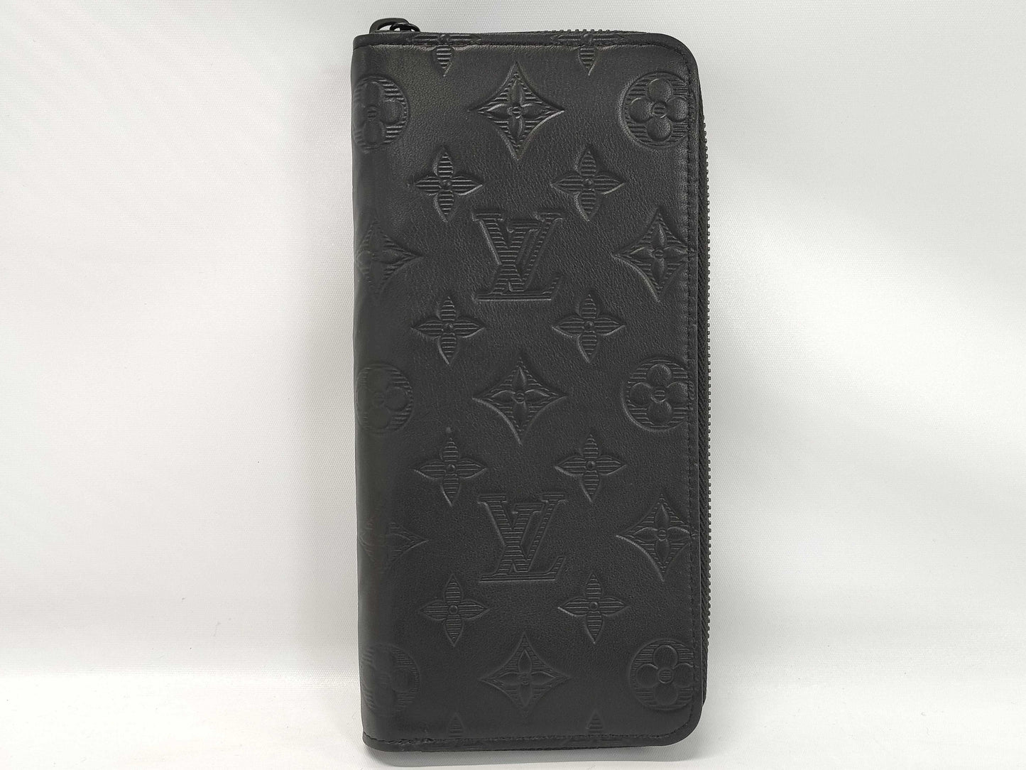 LOUIS VUITTON Zippy Wallet Vertical Monogram Shadow. Includes box, dust bag, and other original accessories. Brand new, unused wallet.